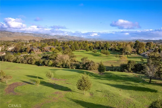 a view of a city with a lake