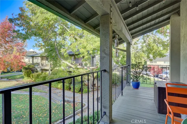 a view of balcony with furniture