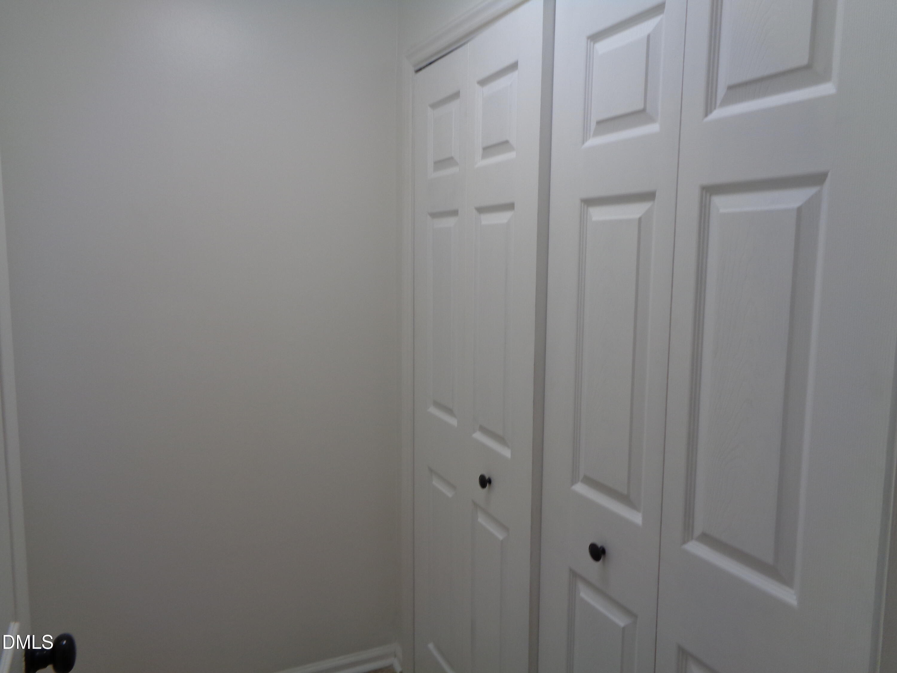 8331 Hempshire Place, Unit 102 Raleigh, NC 27613 - Photo 22 of 26 Laundry closet