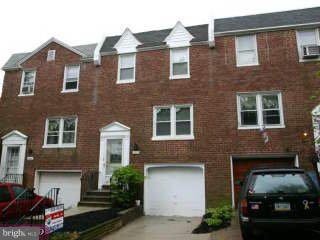 2810 Woodbridge Road Philadelphia, PA 19114 - Photo 1 of 1 a front view of a house with parking space