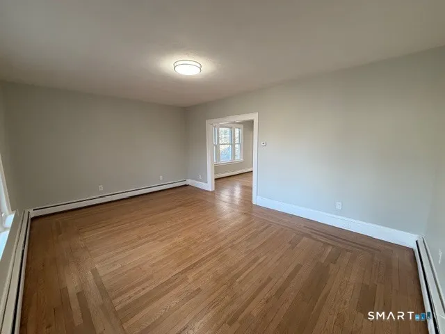 a view of an empty room and window