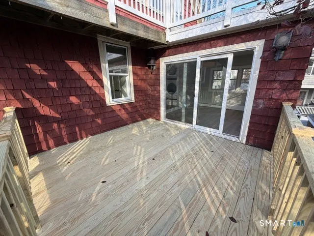 a view of backyard with large windows