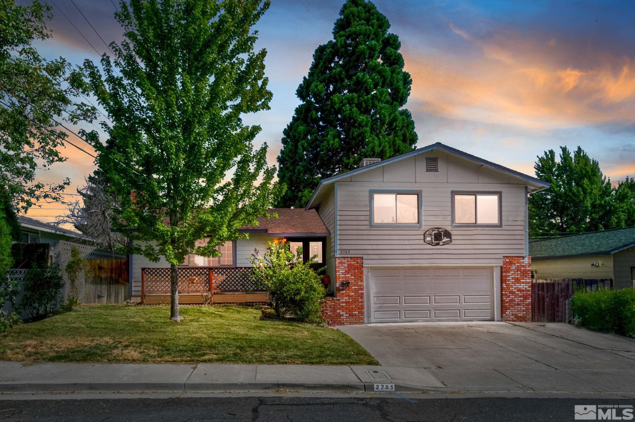 2785 Judith Lane Reno, NV 89503 - Photo 1 of 26 front view of a house with a yard