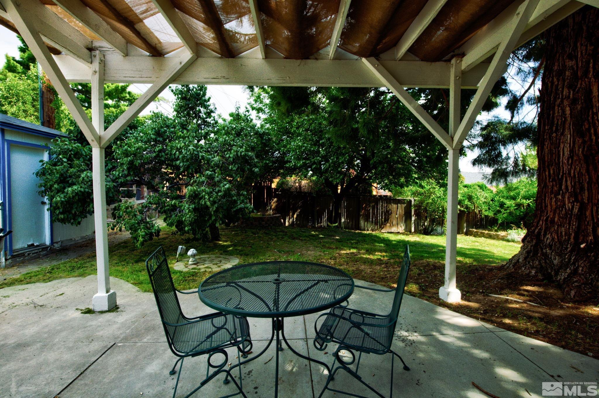 2785 Judith Lane Reno, NV 89503 - Photo 25 of 26 a view of a chair and table in backyard of the house