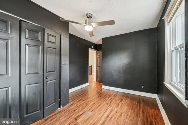 a view of entryway with wooden floor