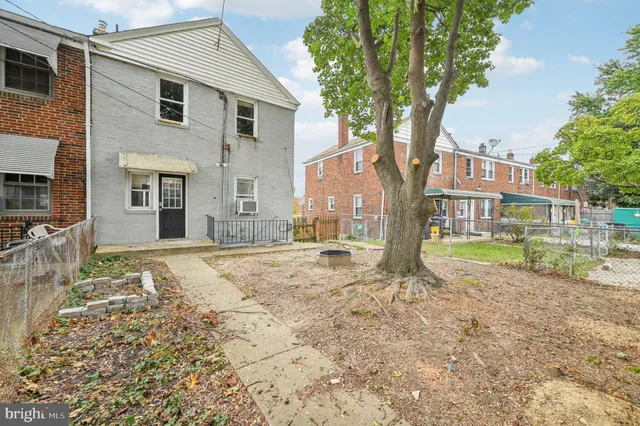 a house with trees in front of it