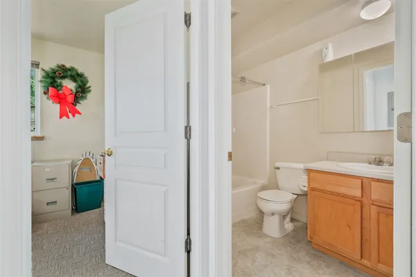 a bathroom with a sink a toilet and a bathtub