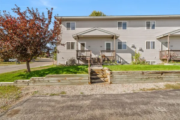 front view of a house with a small yard