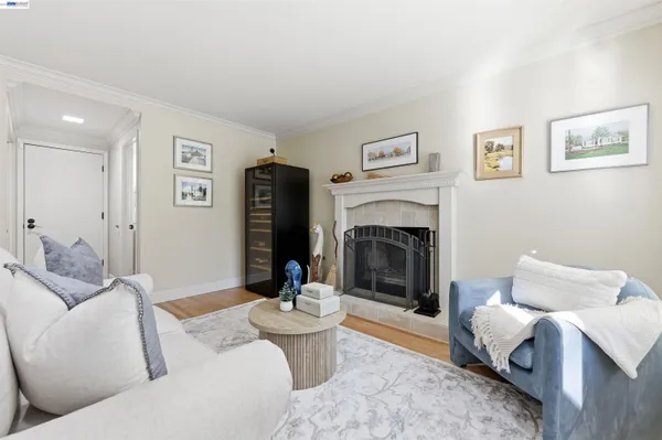 a kitchen with sink refrigerator and dining table