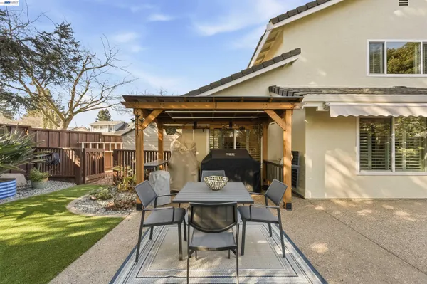 a view of a terrace with furniture