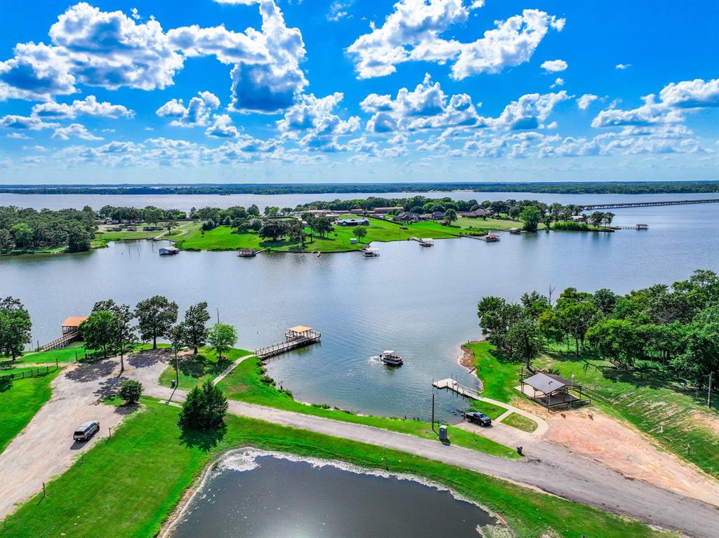 a view of a lake with a city