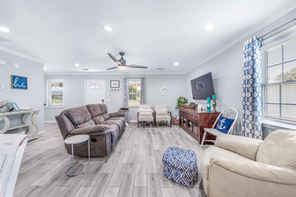 154 Wapiti Quitman, TX 75783 - Photo 3 of 24 a living room with furniture and a wooden floor