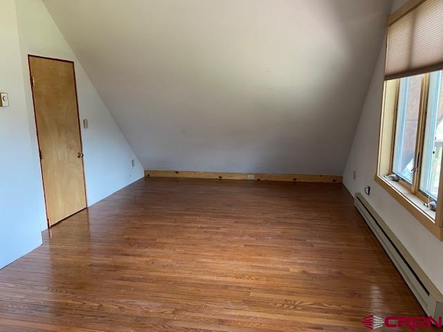300 Quartz Lane Pitkin, CO 81241 - Photo 17 of 22 wooden floor in an empty room with a window
