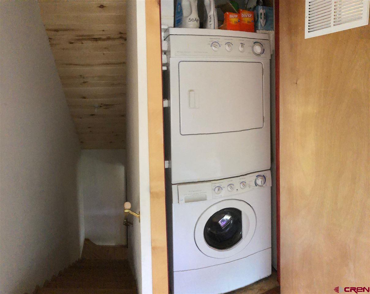 300 Quartz Lane Pitkin, CO 81241 - Photo 18 of 22 a utility room with dryer and washer