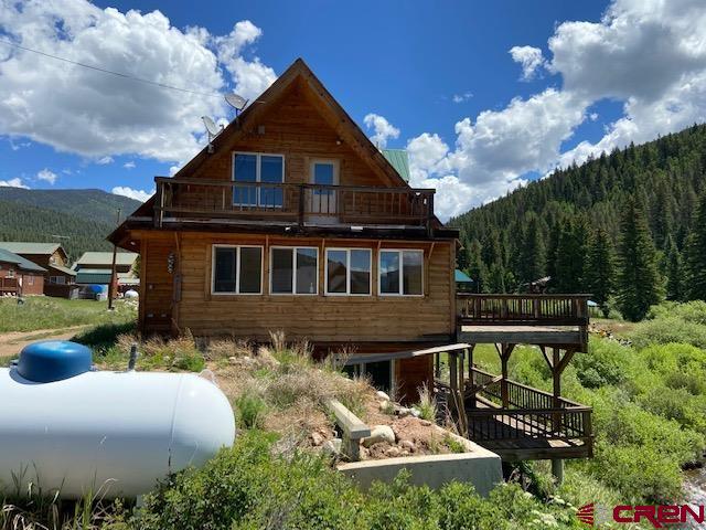 300 Quartz Lane Pitkin, CO 81241 - Photo 4 of 22 a front view of a house with garden