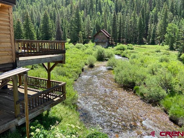 300 Quartz Lane Pitkin, CO 81241 - Photo 5 of 22 a view of a bench in a garden