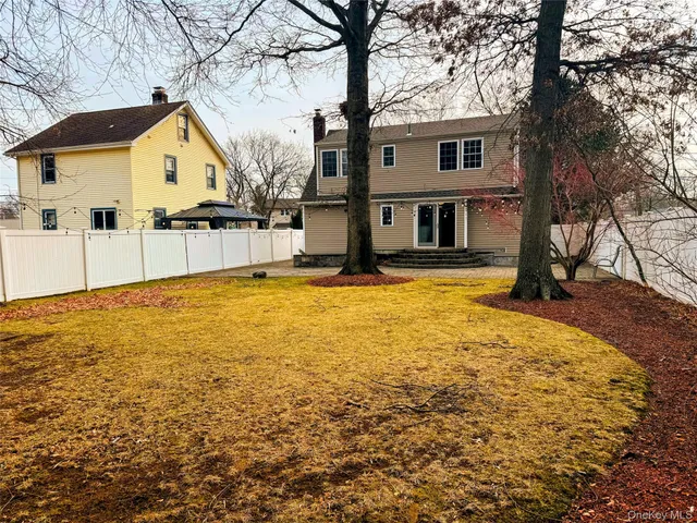 a view of a house with swimming pool