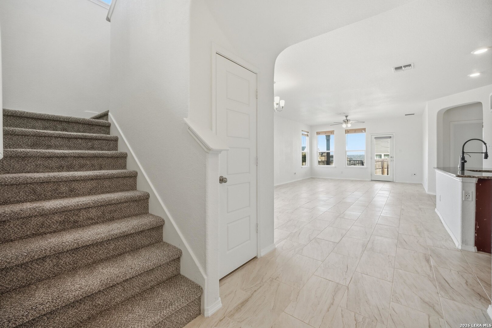 9305 Devils River Converse, TX 78109 - Photo 11 of 34 a view of entryway and hall with wooden floor