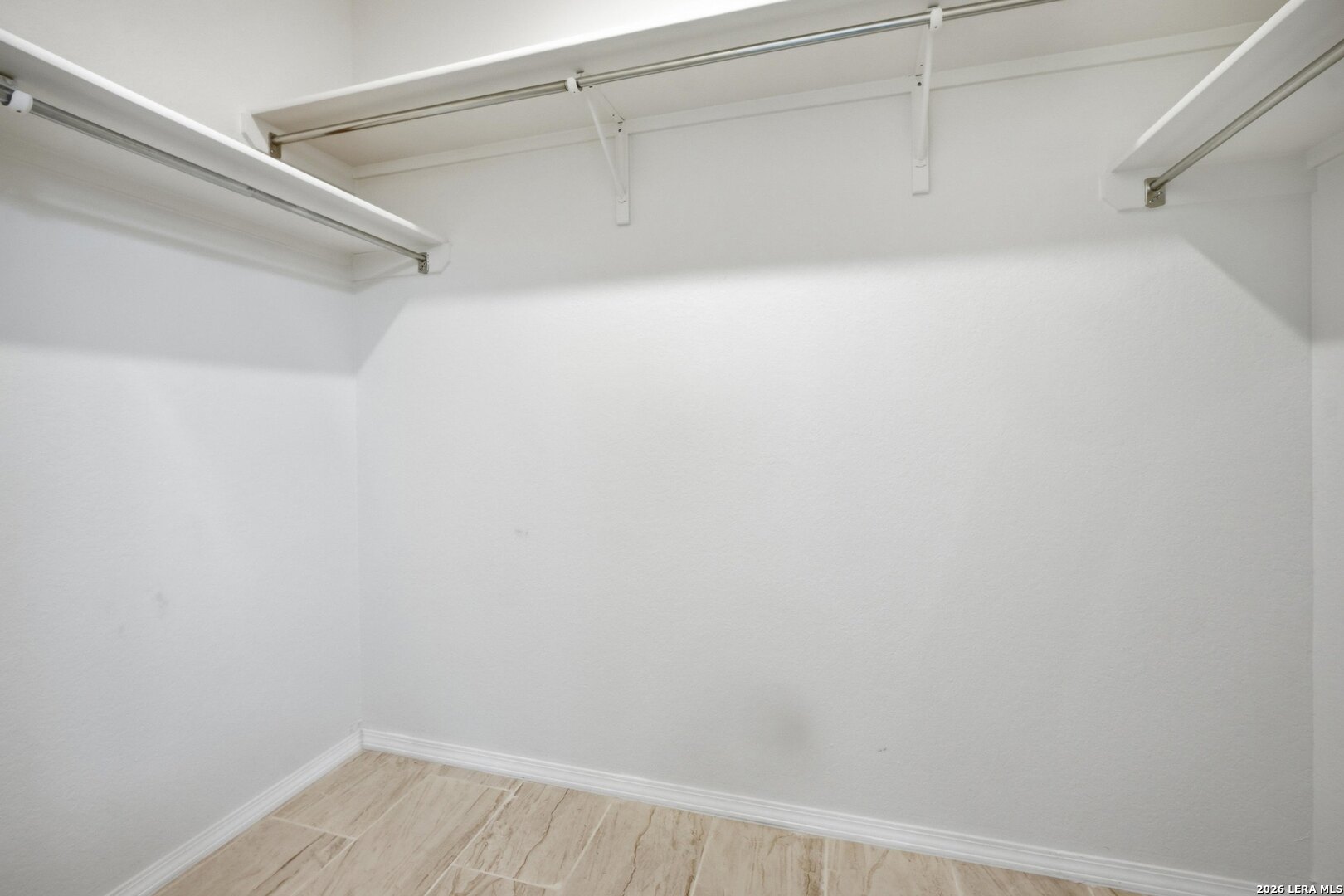 9305 Devils River Converse, TX 78109 - Photo 23 of 34 a view of an empty walk in closet