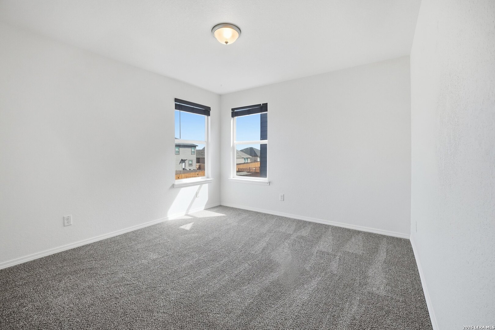 9305 Devils River Converse, TX 78109 - Photo 26 of 34 an empty room with windows