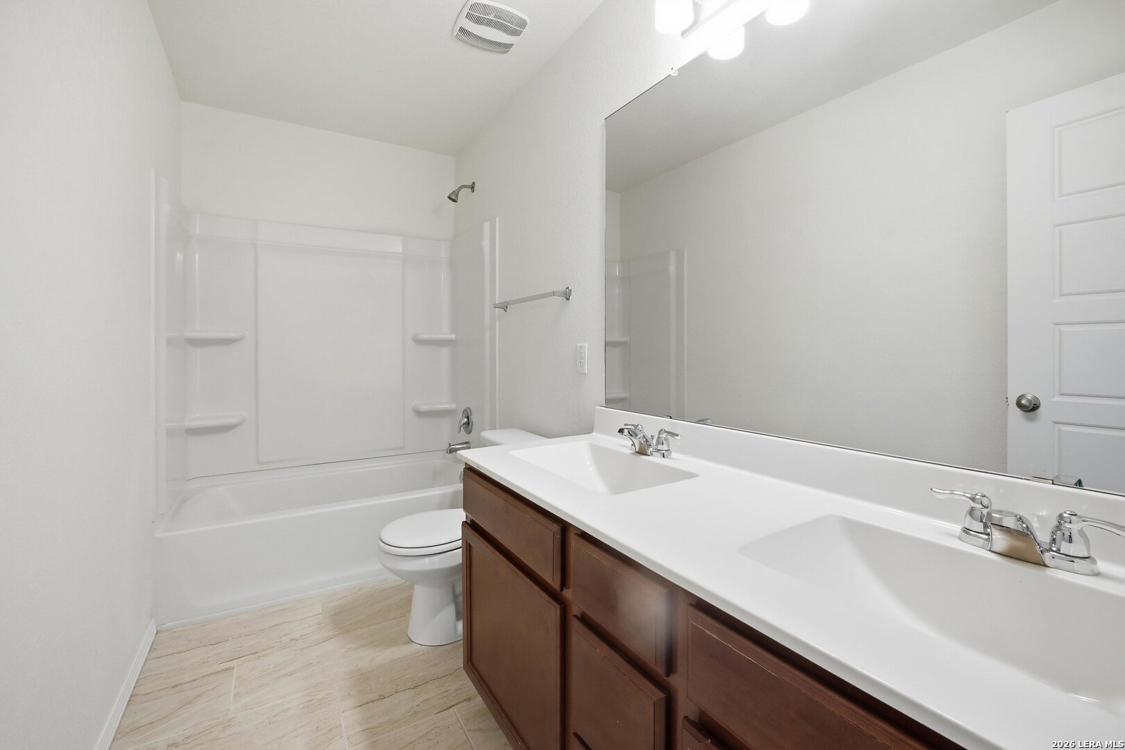 9305 Devils River Converse, TX 78109 - Photo 29 of 34 a bathroom with a sink a toilet and shower