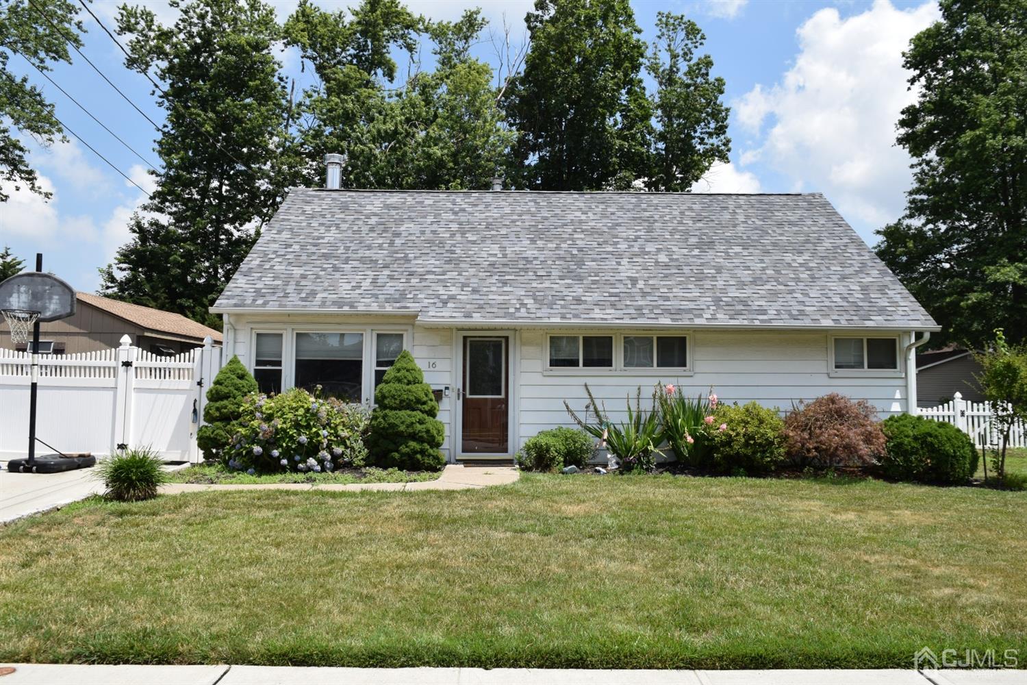16 Parkerson Road Edison, NJ 08817 - Photo 1 of 11 a view of a house with garden and yard