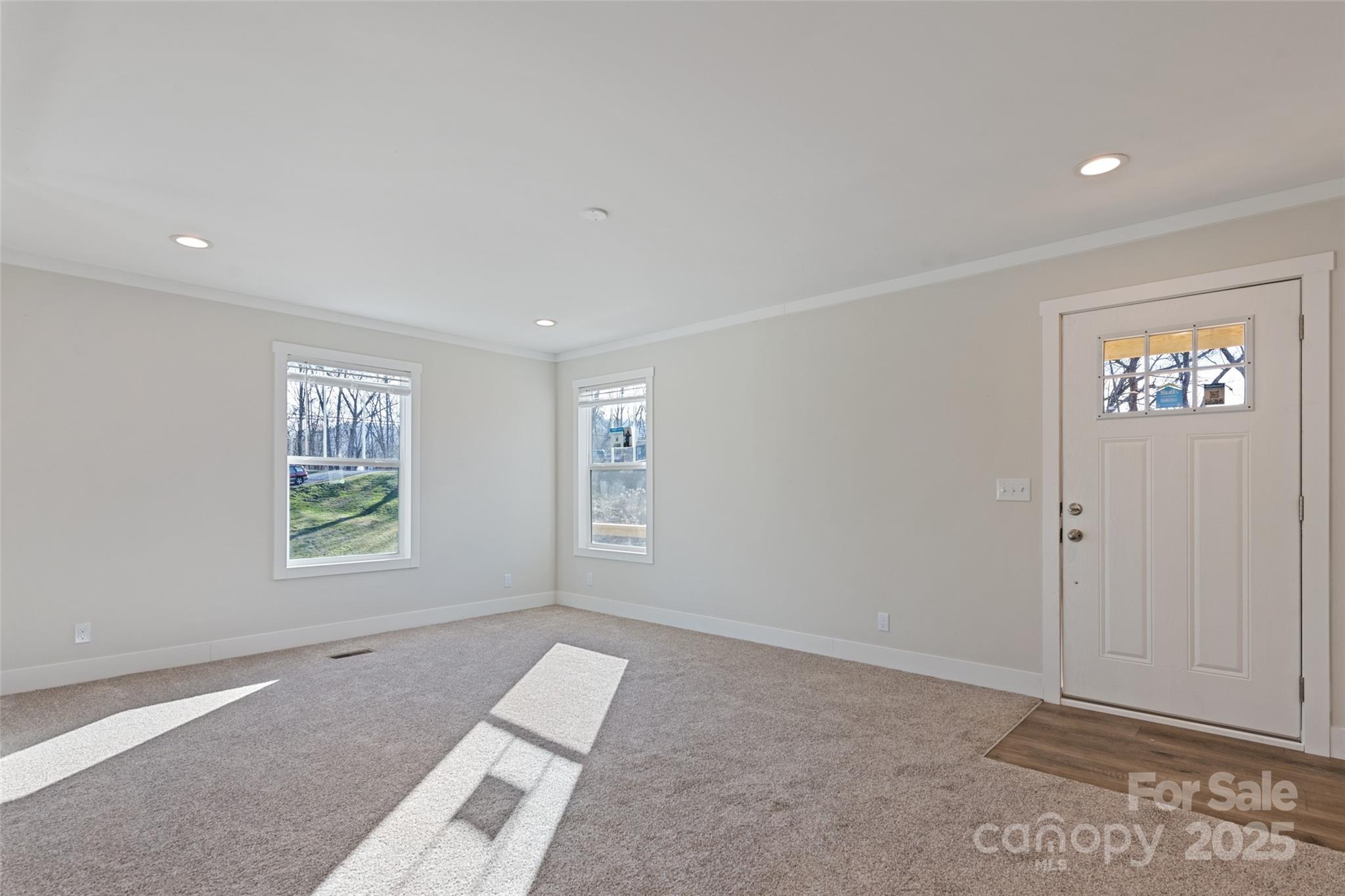 77 Geiranger Drive Clyde, NC 28721 - Photo 13 of 29 a view of an empty room with a window