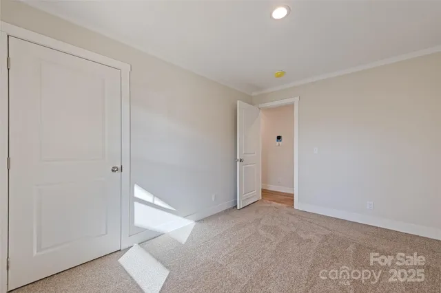 a bathroom with a sink toilet vanity and shower