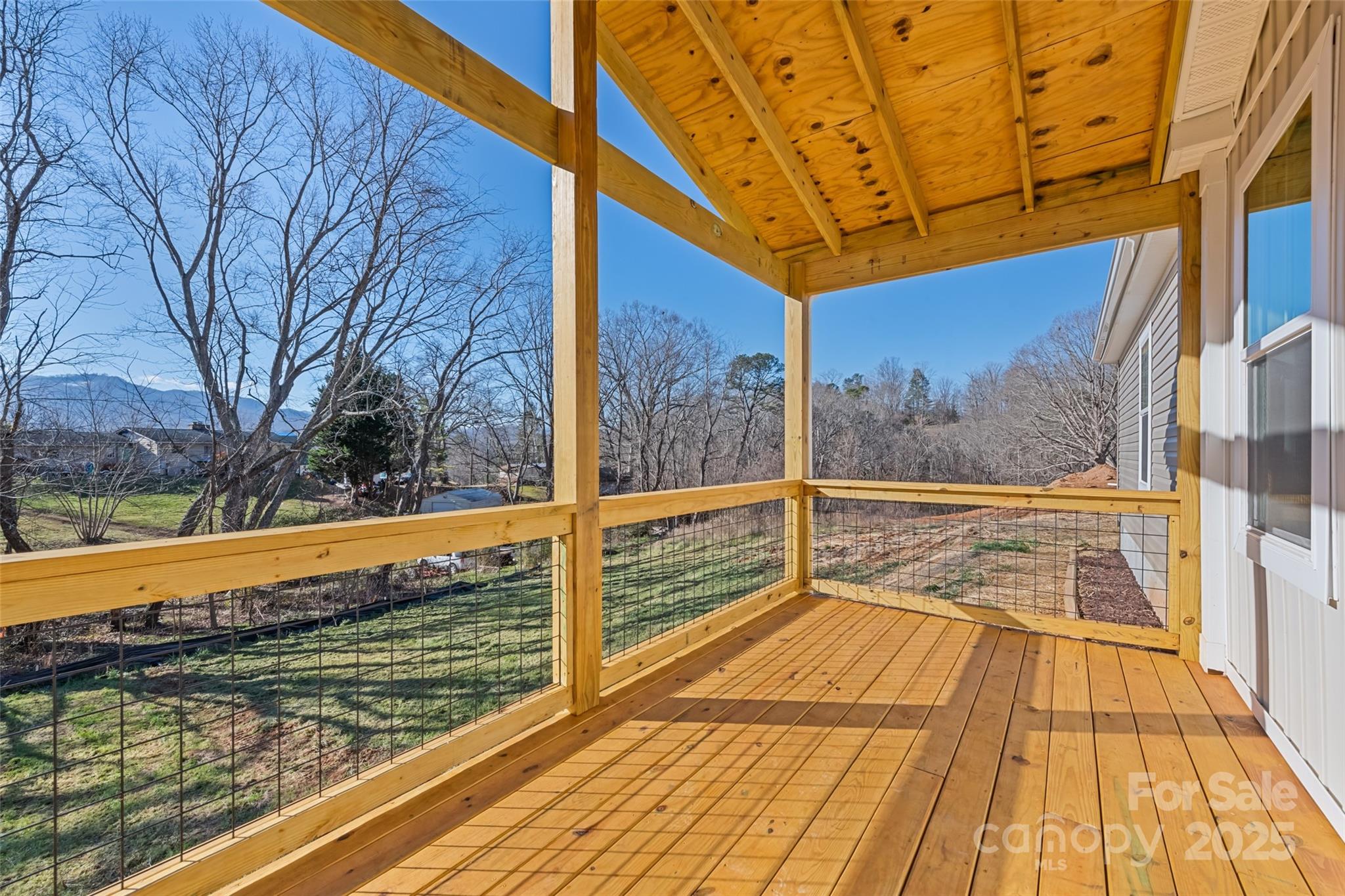 77 Geiranger Drive Clyde, NC 28721 - Photo 9 of 29 a view of a swimming pool with a patio