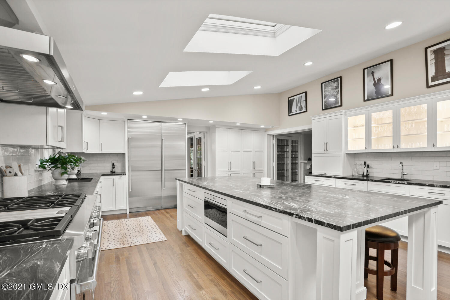 53 Hillcrest Park Road Old Greenwich, CT 06870 - Photo 15 of 53 a kitchen with stainless steel appliances granite countertop a stove and a sink