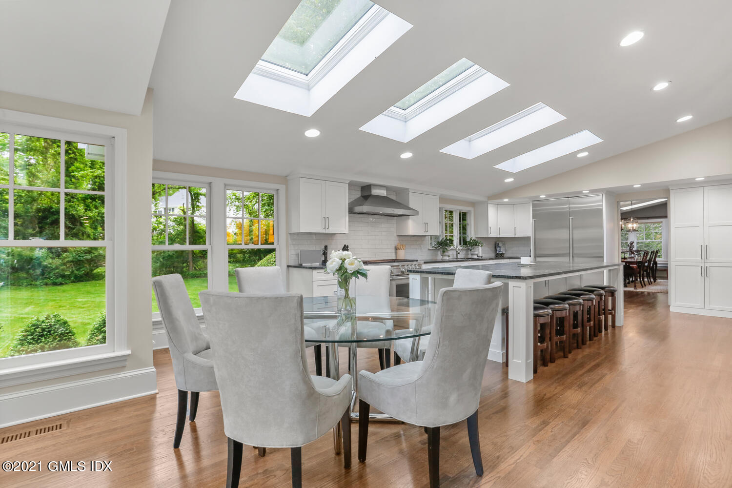 53 Hillcrest Park Road Old Greenwich, CT 06870 - Photo 17 of 53 a view of a dining room with furniture window and wooden floor