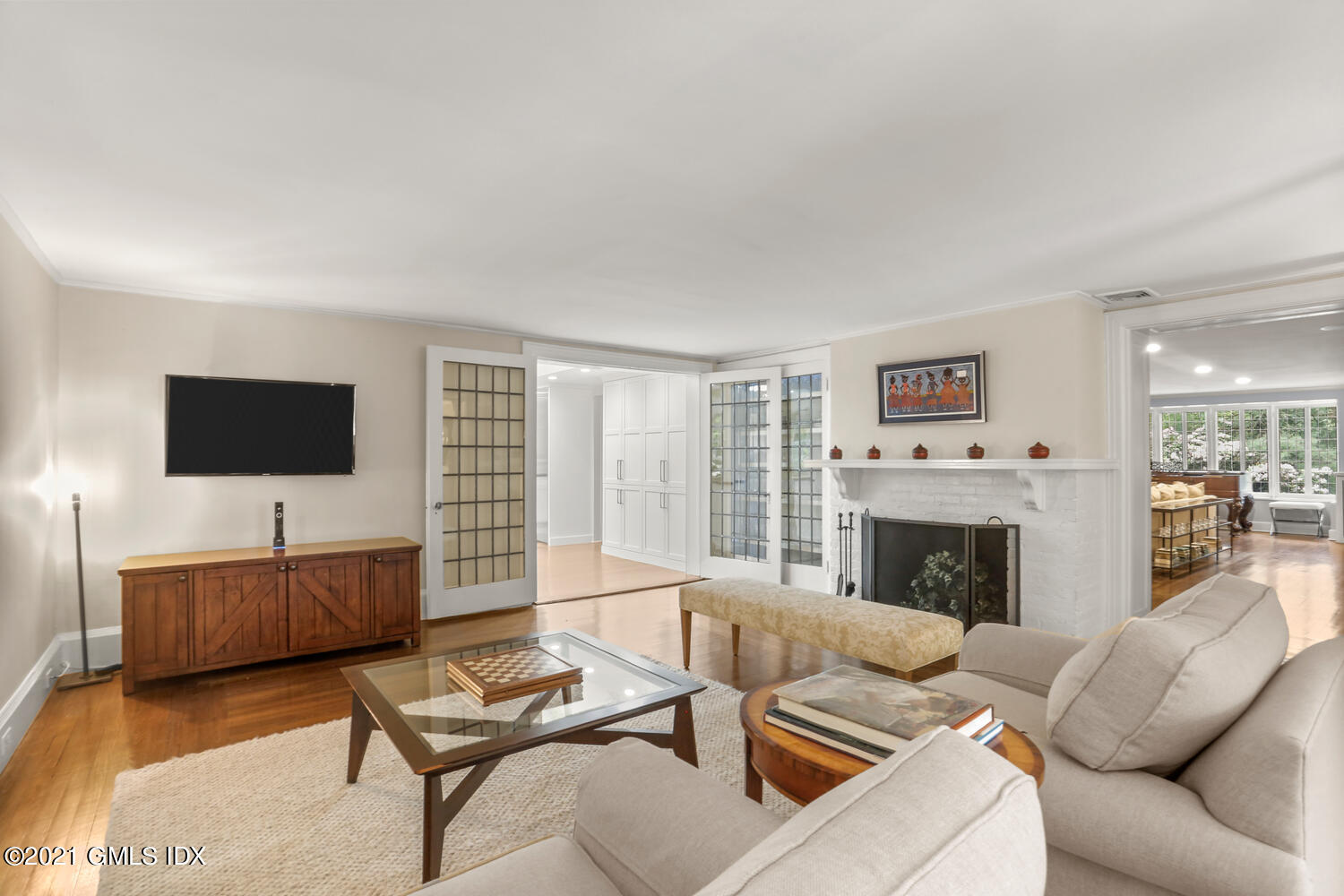 53 Hillcrest Park Road Old Greenwich, CT 06870 - Photo 20 of 53 a living room with furniture and a flat screen tv