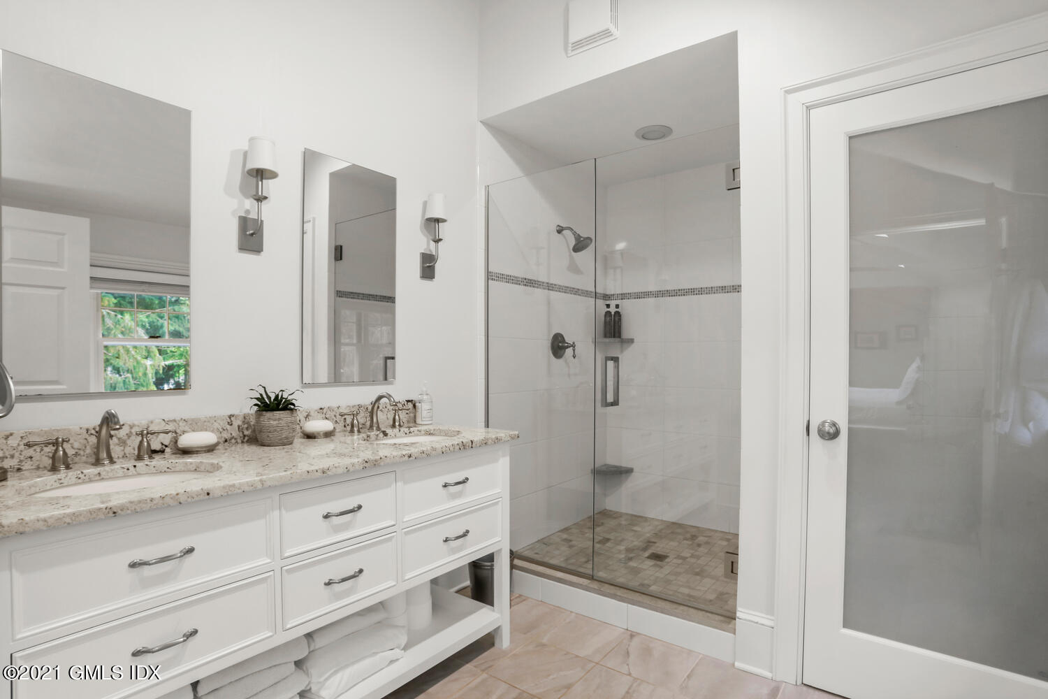 53 Hillcrest Park Road Old Greenwich, CT 06870 - Photo 26 of 53 a bathroom with a granite countertop sink mirror shower and double