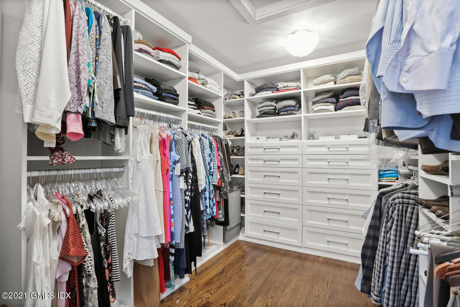 53 Hillcrest Park Road Old Greenwich, CT 06870 - Photo 27 of 53 a view of walk in closet with clothes