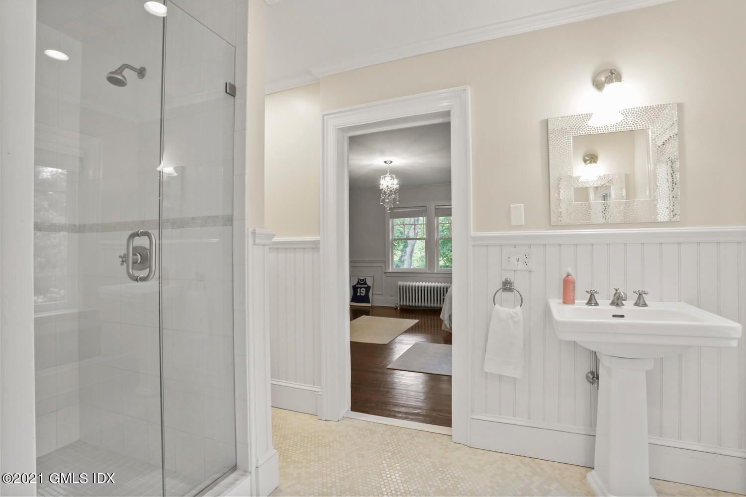 53 Hillcrest Park Road Old Greenwich, CT 06870 - Photo 30 of 53 a bathroom with a sink and mirror