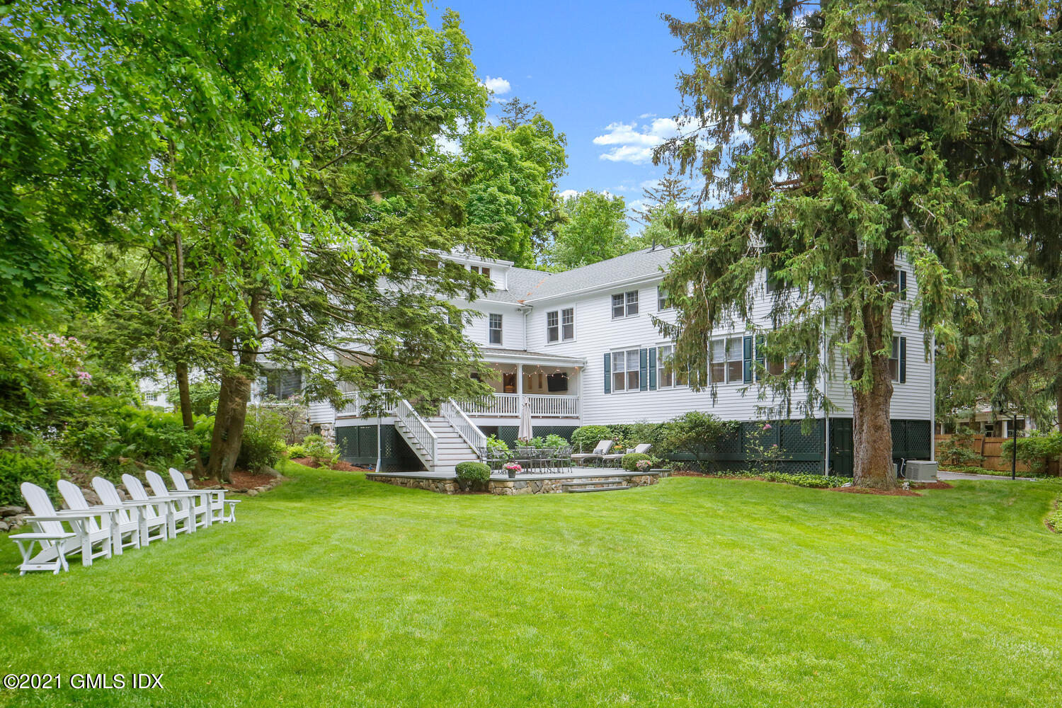 53 Hillcrest Park Road Old Greenwich, CT 06870 - Photo 3 of 53 a front view of a house with garden