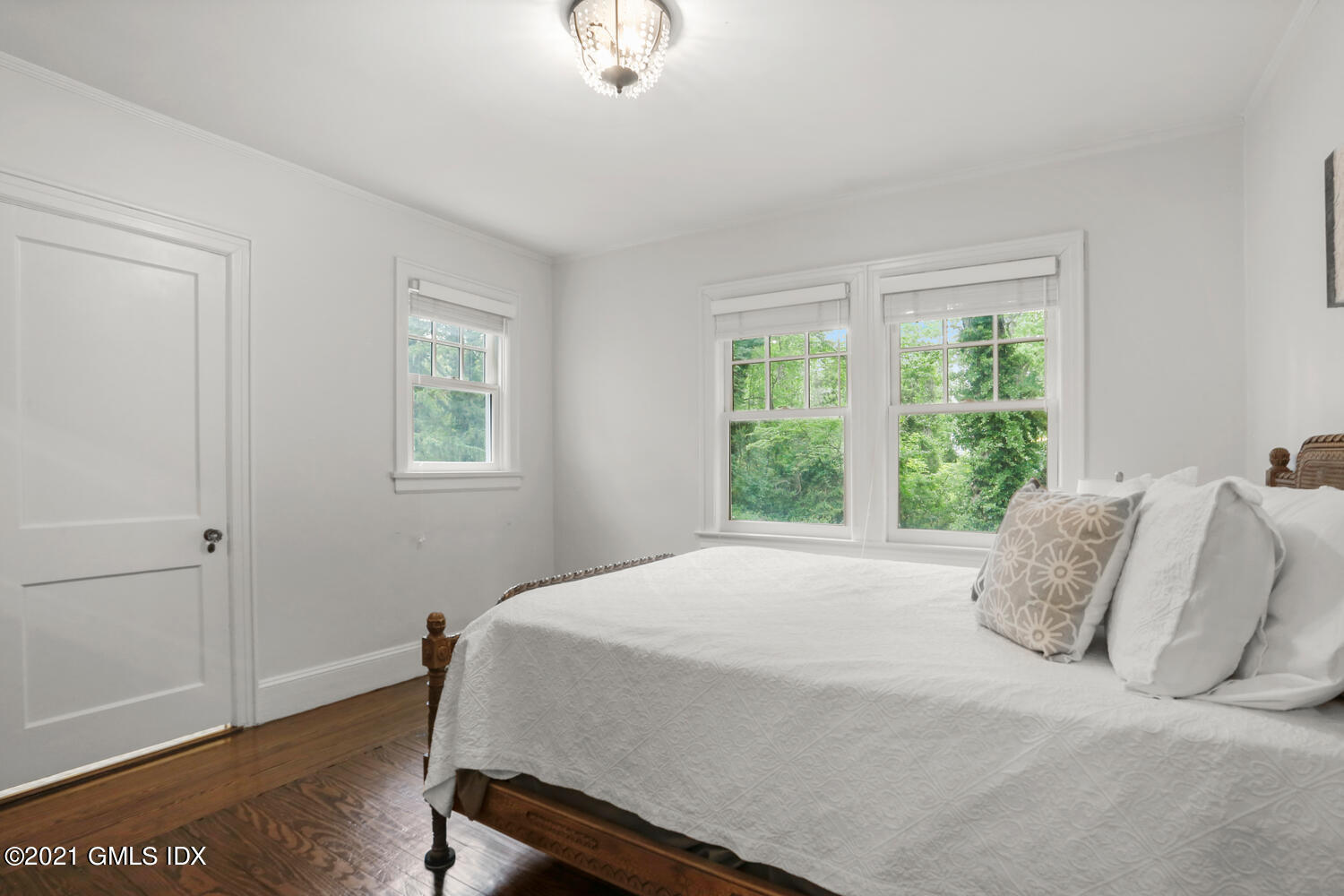 53 Hillcrest Park Road Old Greenwich, CT 06870 - Photo 32 of 53 a bedroom with a bed and a window