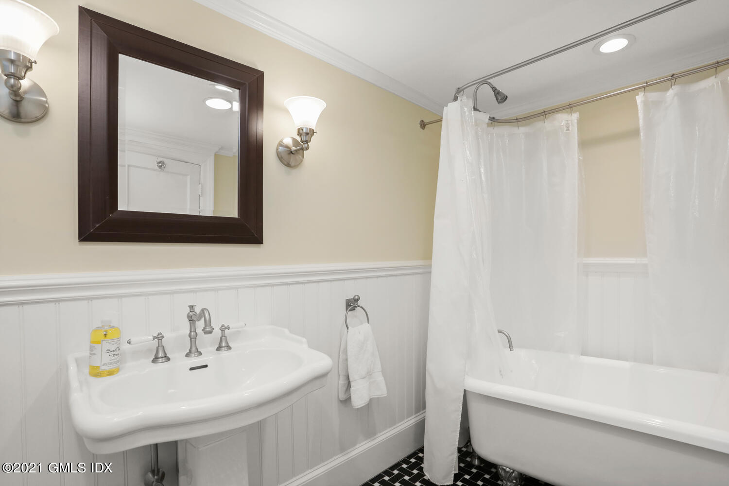 53 Hillcrest Park Road Old Greenwich, CT 06870 - Photo 36 of 53 a bathroom with a sink a toilet and a bathtub