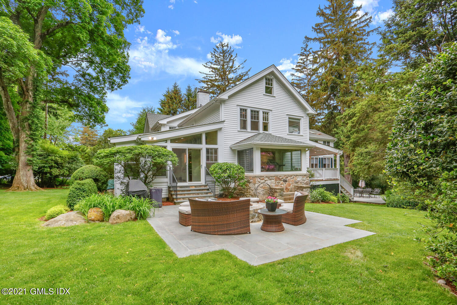 53 Hillcrest Park Road Old Greenwich, CT 06870 - Photo 42 of 53 a view of a house with backyard and sitting area