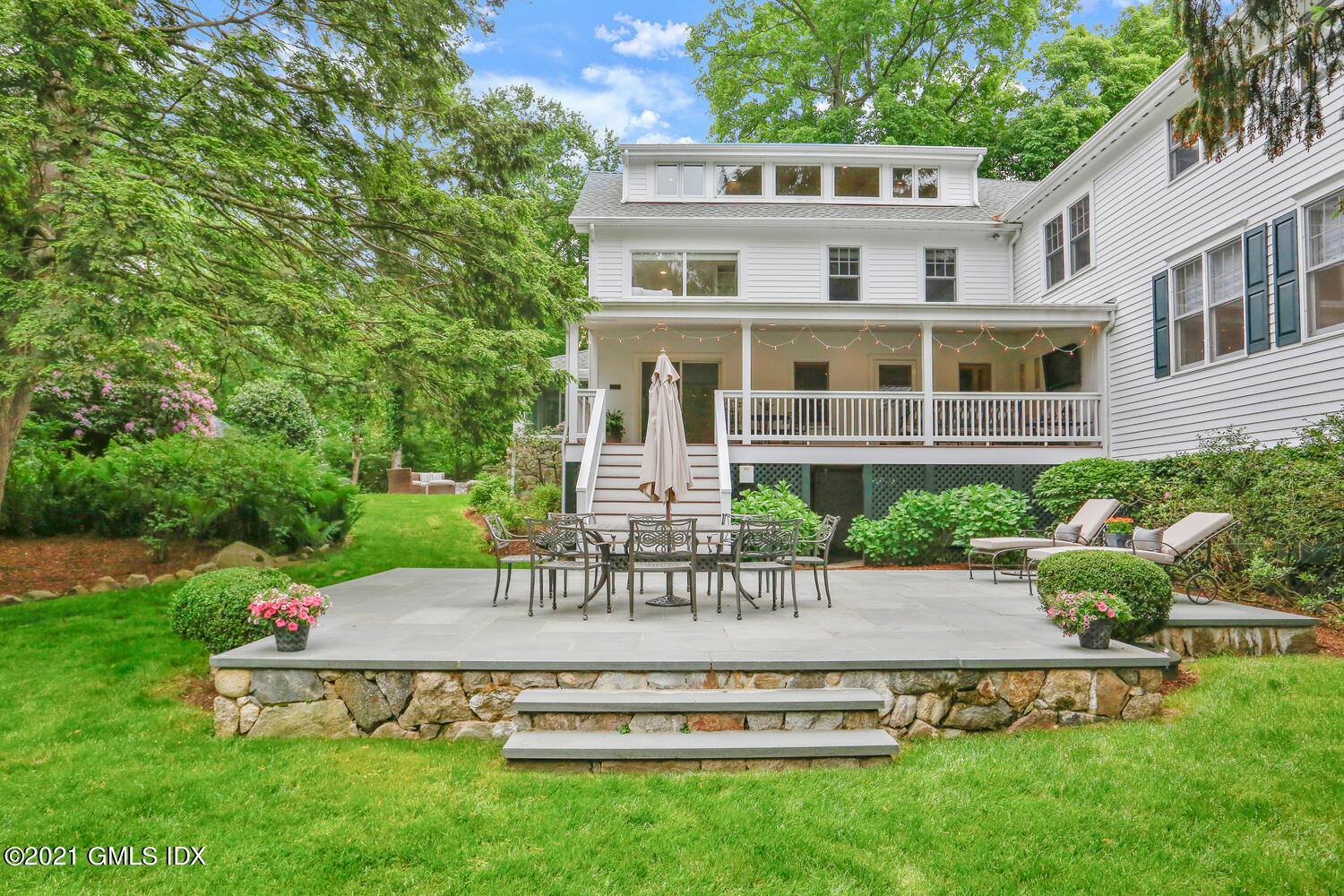 53 Hillcrest Park Road Old Greenwich, CT 06870 - Photo 45 of 53 a view of a house with a yard