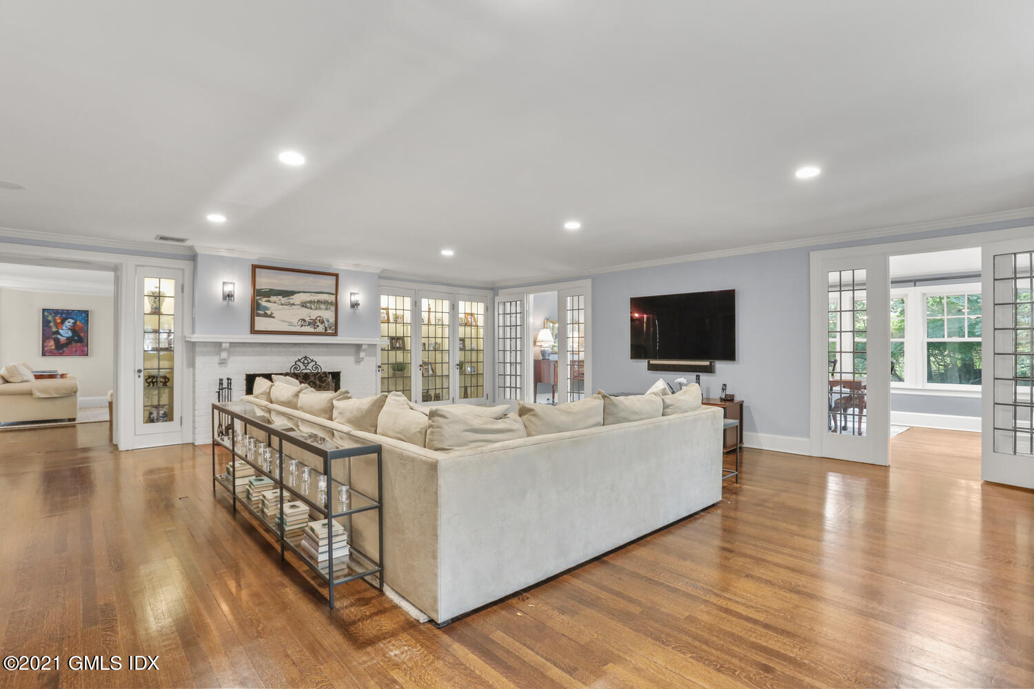 53 Hillcrest Park Road Old Greenwich, CT 06870 - Photo 9 of 53 a living room with furniture and a flat screen tv