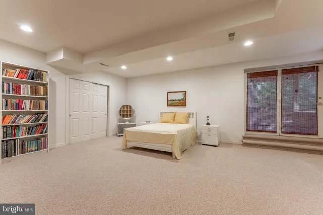 a view of balcony with wooden floor and outdoor seating
