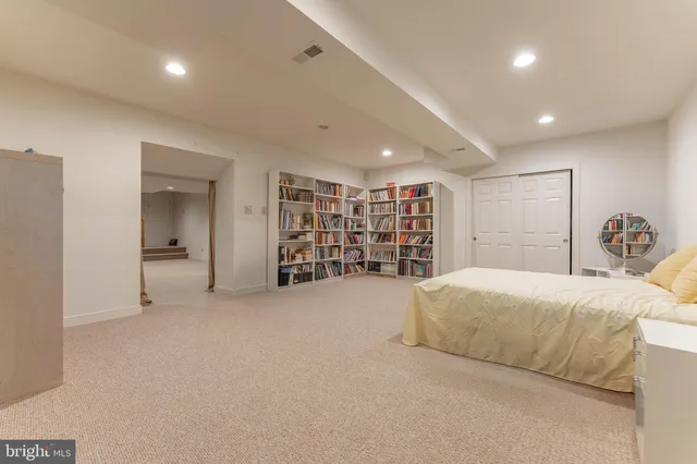 a view of balcony with wooden floor and outdoor seating