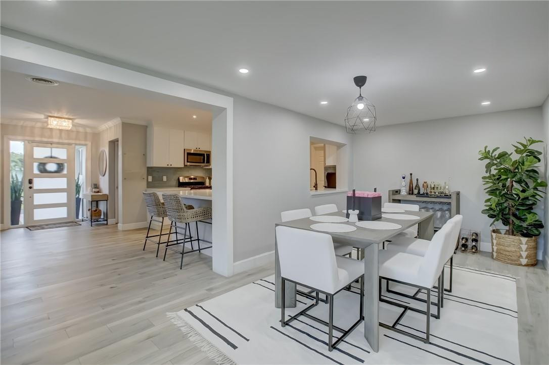 4117 McKinley Street Hollywood, FL 33021 - Photo 24 of 52 a view of a dining room with furniture