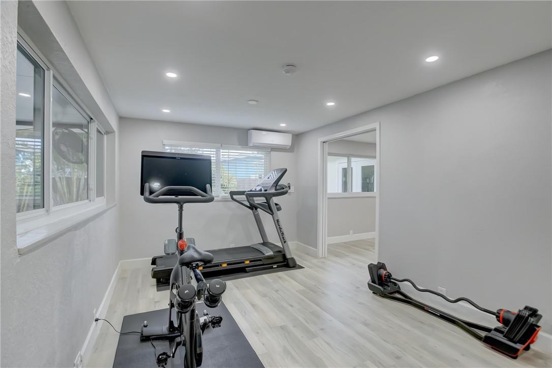 4117 McKinley Street Hollywood, FL 33021 - Photo 26 of 52 a view of a room with gym equipment