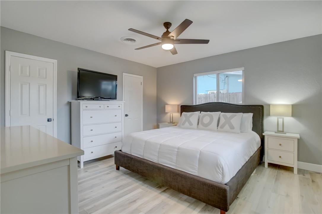 4117 McKinley Street Hollywood, FL 33021 - Photo 29 of 52 a bedroom with a bed and a flat screen tv