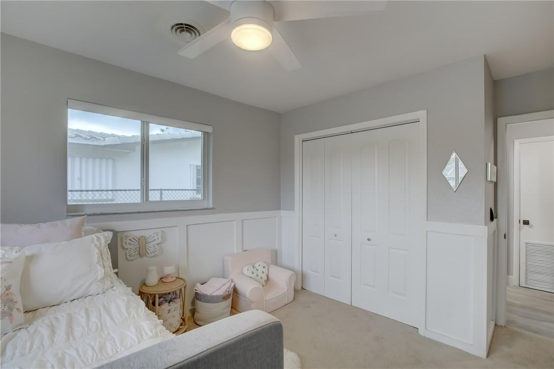 4117 McKinley Street Hollywood, FL 33021 - Photo 42 of 52 a living room with furniture and a window