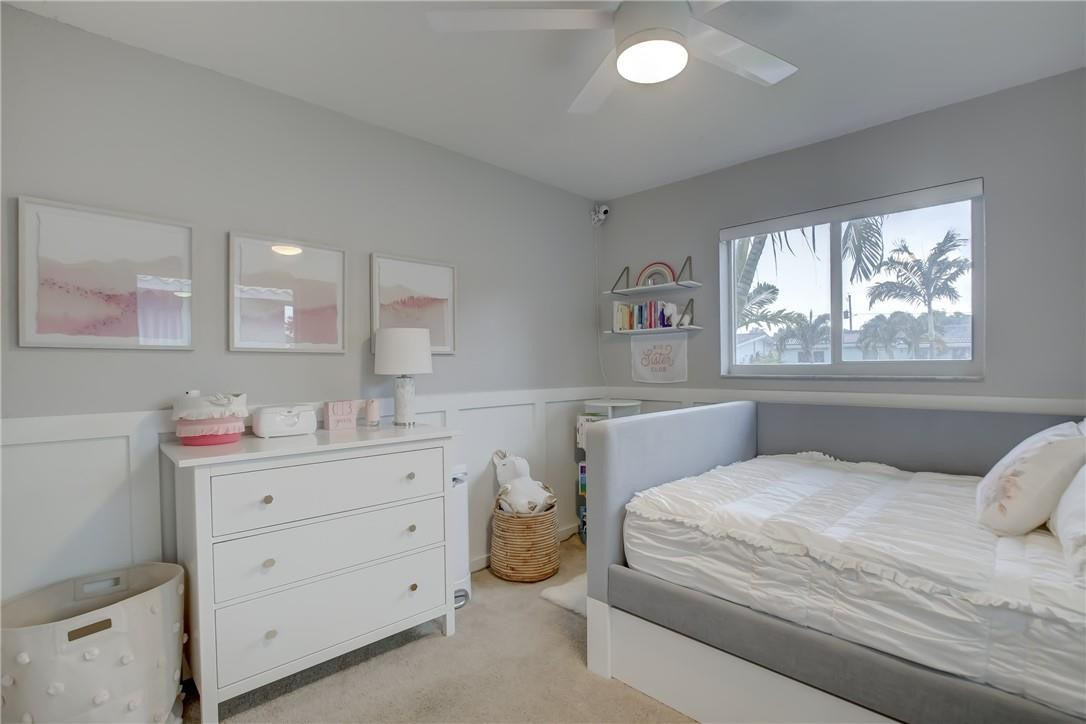 4117 McKinley Street Hollywood, FL 33021 - Photo 43 of 52 a bedroom with a bed and a window