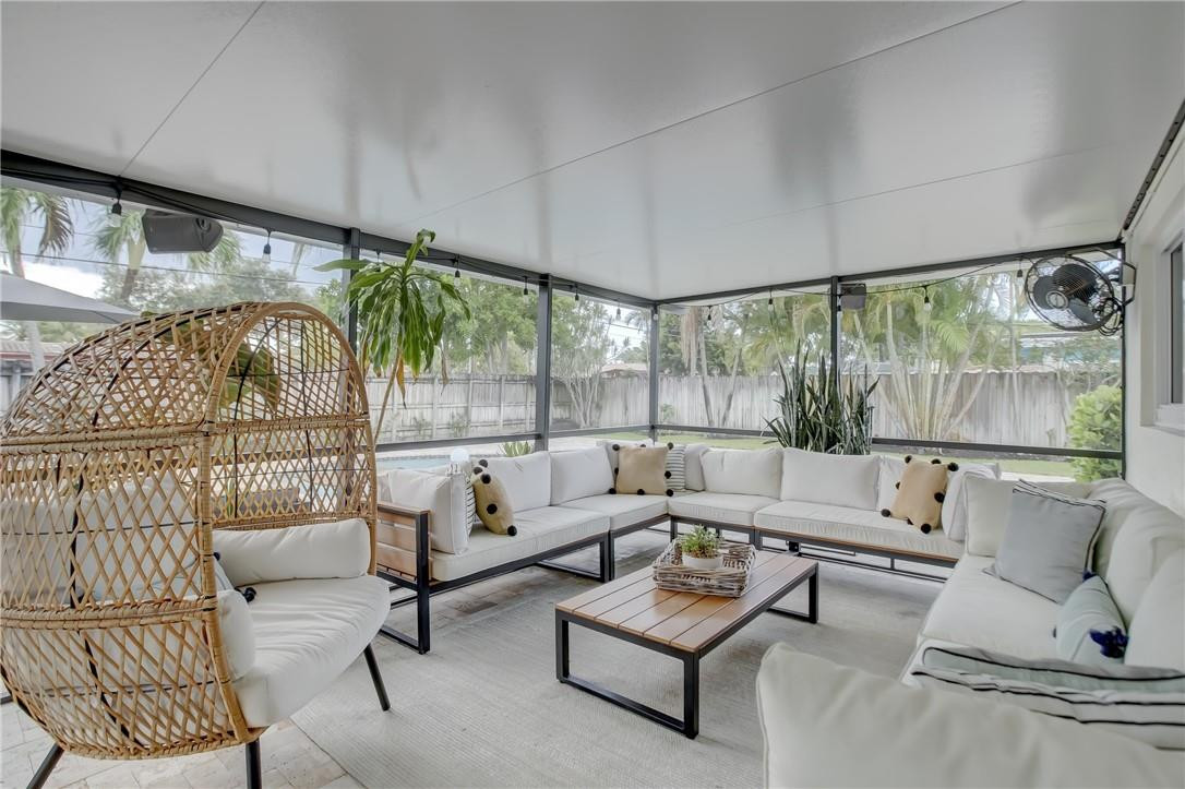 4117 McKinley Street Hollywood, FL 33021 - Photo 44 of 52 a living room with furniture and a large window