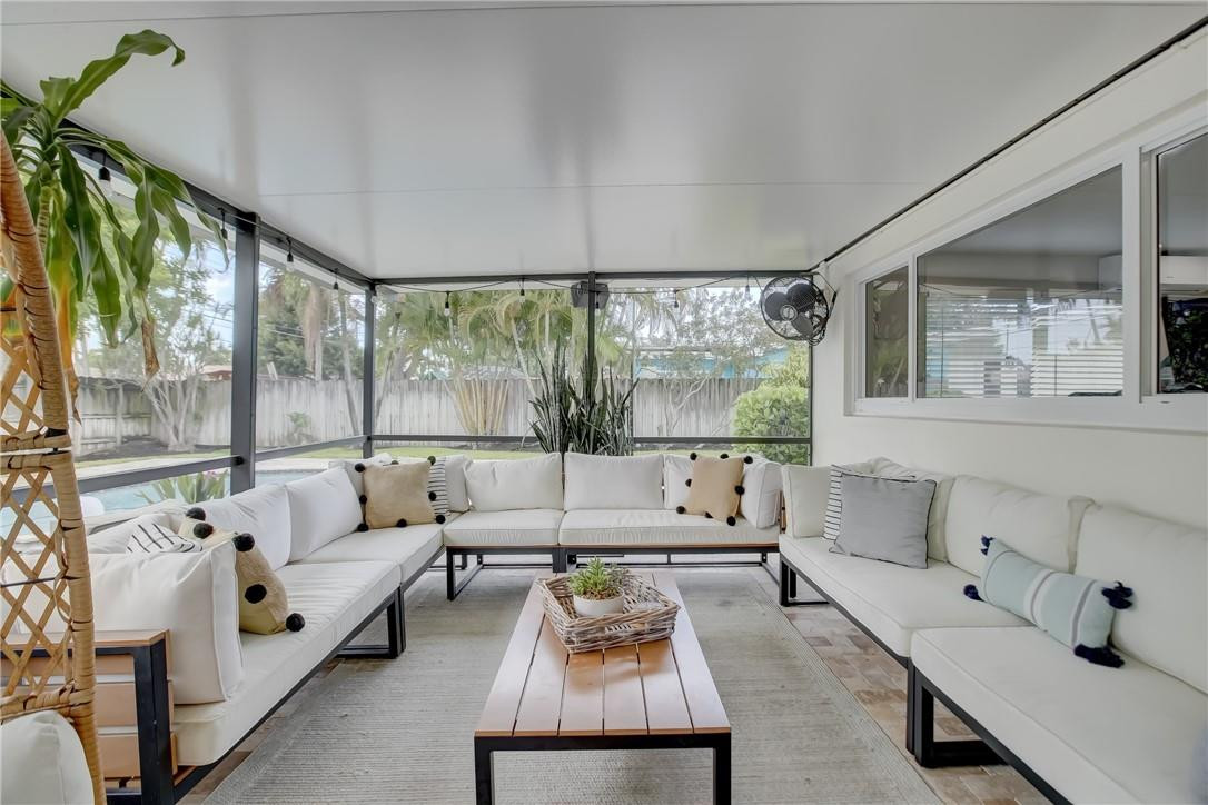 4117 McKinley Street Hollywood, FL 33021 - Photo 46 of 52 a living room with furniture and a large window